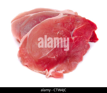 Drei rohes frisches saftiges Schweinefleisch Steaks isoliert auf weiss Stockfoto