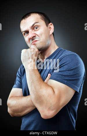 Neugierige Menschen Ausdruck, Studio gedreht Stockfoto