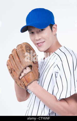 Ein Baseball-Spieler tragen einen Handschuh Stockfoto