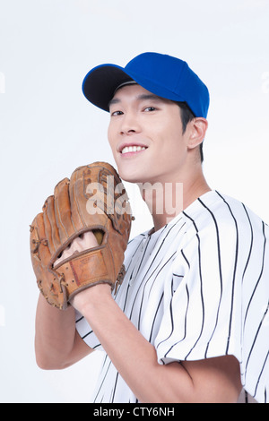 Ein Baseball-Spieler tragen einen Handschuh Stockfoto