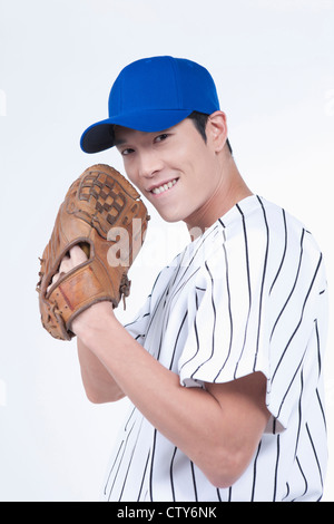 Ein Baseball-Spieler tragen einen Handschuh Stockfoto