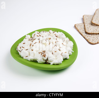 Hüttenkäse mit Kreuzkümmel Stockfoto
