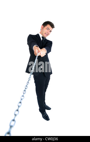 Isolierte Jungunternehmen Mann Zugkette Stockfoto