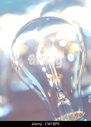 Weißglühende Glühlampe Closeup abstrakten Hintergrund beleuchtet Stockfoto