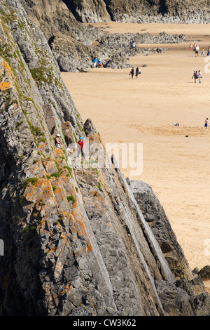 Kletterer am Three Cliffs Bay, Gower, South Wales. Stockfoto