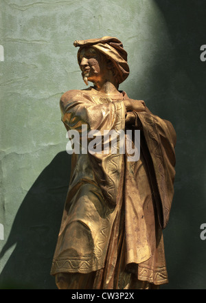 Eines der vergoldeten Skulpturen, die an den Wänden des chinesischen Hauses, ein Gartenpavillon im Park Sanssouci in Potsdam stehen. Stockfoto