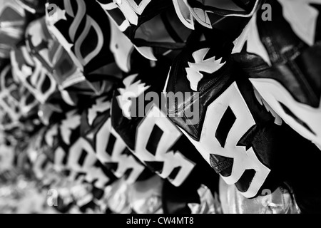 Lucha Libre wrestling Masken, inspiriert von denen getragen durch professionelle Wrestler, zum Verkauf in einem Geschäft in Mexiko-Stadt. Stockfoto