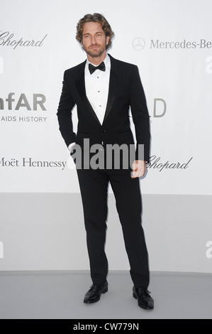 Gerard Butler kommt für das AmfAR-Kino gegen AIDS nutzen auf das Hotel du Cap-Eden-Roc, während der Filmfestspiele von Cannes. Stockfoto