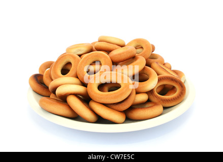 Bagels in Platte isoliert auf weißem Hintergrund. Stockfoto