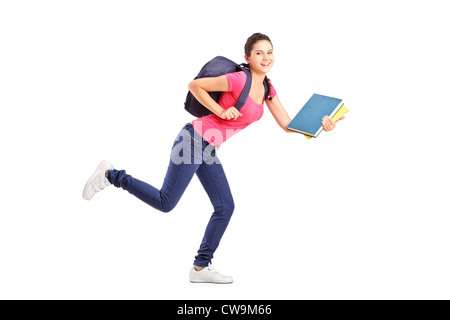 In voller Länge Portrait von ein College-Student in Eile ausgeführt mit Notebooks isoliert auf weißem Hintergrund Stockfoto