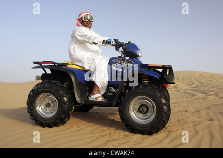 Dubai, Quadfahrer in der Wüste Stockfoto