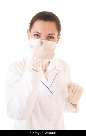 Frau Doktor der Schutzmaske und Handschuhe. Isoliert auf weiss. Stockfoto