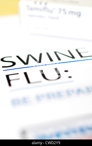 Schweinegrippe-Informationsblatt in den Vordergrund & Box von Tamiflu Tabletten verschwommen im Hintergrund Stockfoto