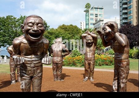 A-Labyrinth-Ing Lachen Bronzeskulpturen von Yue Minjun, Vancouver, Britisch-Kolumbien, Kanada Stockfoto