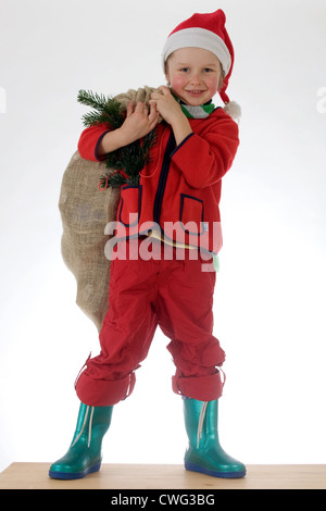 Berlin, Kind als Weihnachtsmann verkleidet Stockfoto