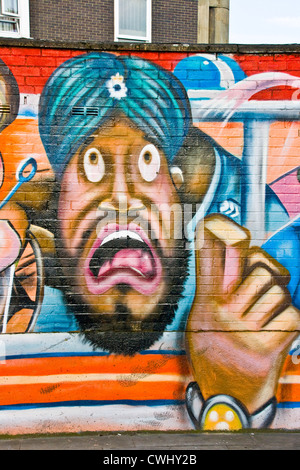 Hell-farbigen urban Graffiti Streetart von männlichen Mann mit Turban auf Ziegel Wand East London England Europa Stockfoto