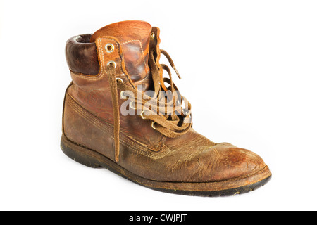 Alte braune Leder Arbeitsstiefel auf weiß Stockfoto