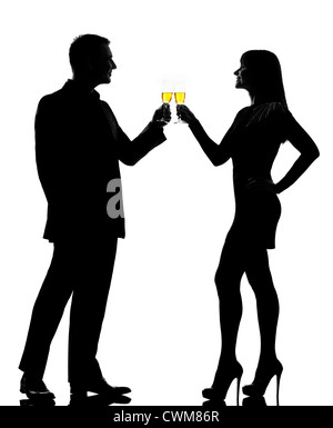 eine kaukasische paar Mann und Frau trinken Champagner Toast Party in Studio Silhouette isoliert auf weißem Hintergrund Stockfoto