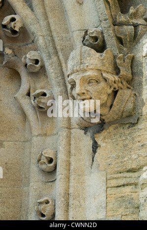 Steinerne mans Kopf auf dem Turm von der Universität Kirche von Str. Mary die Jungfrau Oxford, England Stockfoto