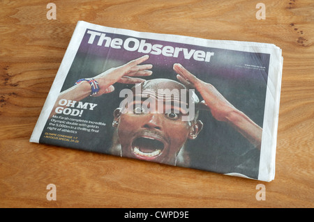 The Observer Zeitung zeigt Mo Farah Gewinn der Goldmedaille bei den Olympischen Spielen London 2012 Stockfoto