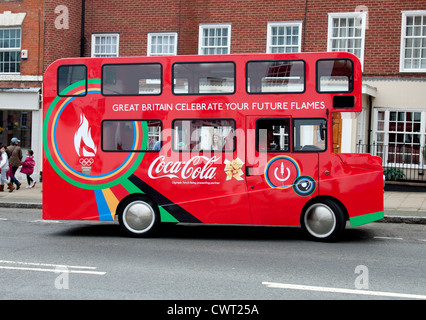 Coca Cola Olympische Fackel-Relais-bus Stockfoto