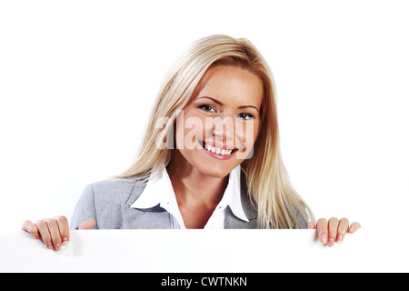 Geschäftsfrau, versteckt hinter einem weißen Blatt Papier Stockfoto