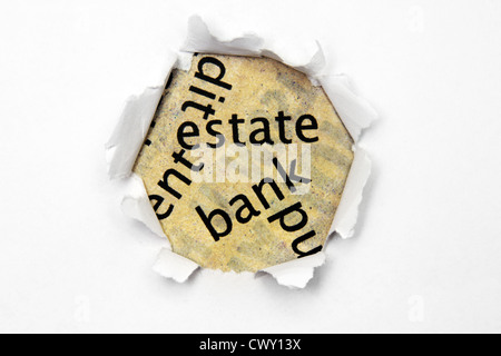 Immobilien-Text auf Papier Loch Stockfoto