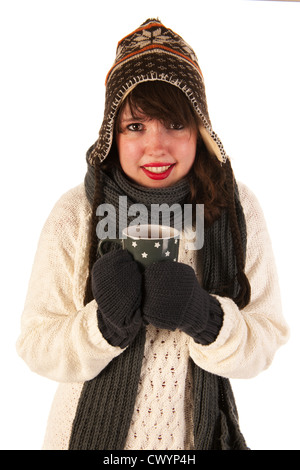 Winter Mädchen mit Eiskappe Wolle Pullover und Handschuhe trinken heißen Schokolade Stockfoto