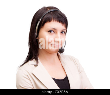 Eine lächelnde junge Frau trägt ein Telefon-Kopfhörer. Stockfoto
