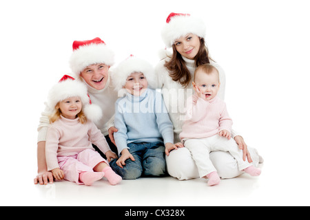 glückliche Familie auf Boden liegend in Studio isoliert auf weiss Stockfoto