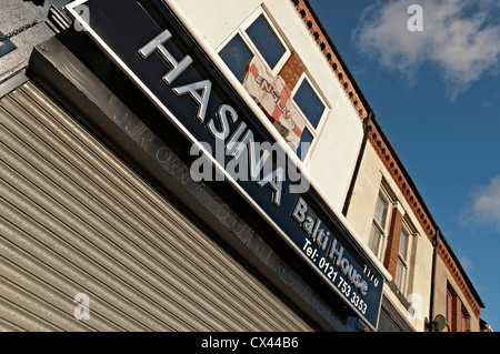 Birmingham Ladypool Weg nach Hause die Balti Dreieck und auch asiatischen hauptsächlich pakistanischen Modeshops Stockfoto