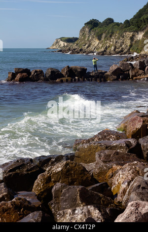 Einsamer Fotograf in Steephill Cove, Isle Of Wight. Stockfoto