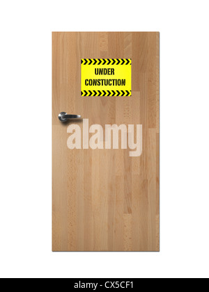 Eine konzeptionelle Holztür mit Zeichen isoliert auf weiss Stockfoto