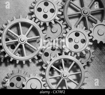 ein Uhrwerk Zahnräder Metall-Hintergrund Stockfoto