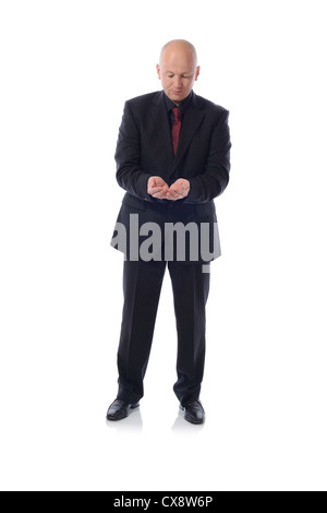 Geschäftsmann im Anzug in einer Holding-pose Stockfoto