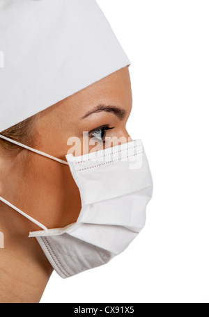 Profil des Chirurges junge Frau trägt eine Maske. Stockfoto