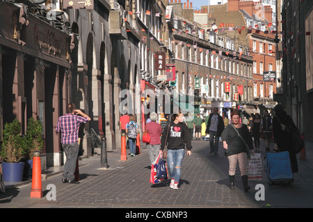 Einkaufen in Lisle Street Chinatown Soho London Stockfoto