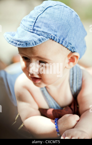 Sechste Reittiere alte Baby Boy Porträt Stockfoto