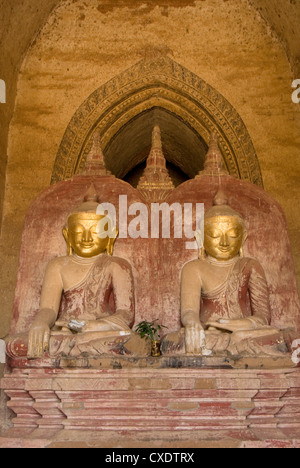 Dhammayangyi Pahto, Bagan (Pagan), Myanmar (Burma), sitzende Buddhas, Asien Stockfoto