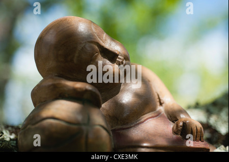 Hölzerne Buddha-statue Stockfoto