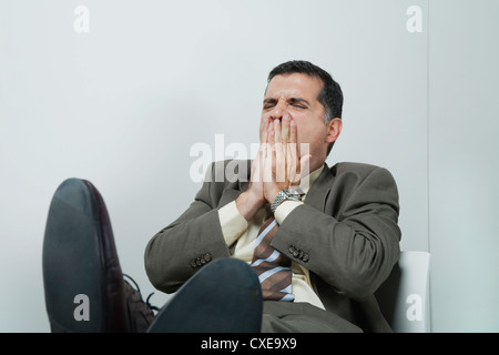 Geschäftsmann, Gähnen Stockfoto