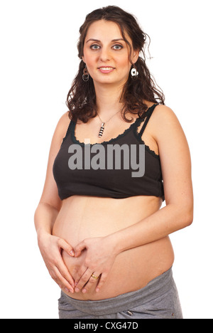 Schwangere Frau machen Herzform mit Händen Onher Bauch isoliert auf weißem Hintergrund Stockfoto