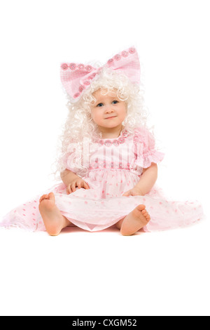 Babymädchen im rosa Kleid Stockfoto