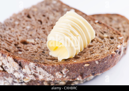 Stück Brot mit butter Stockfoto