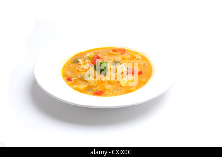 Lecker Hühnchen-Curry in einem tiefen Teller Stockfoto