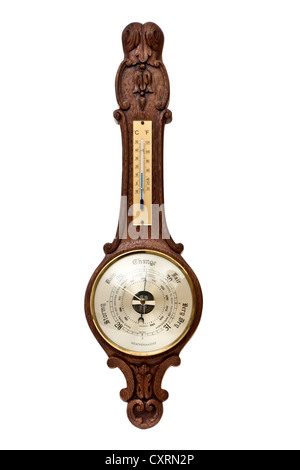 WeatherMaster Barometer und Thermometer im geschnitzten Holzgehäuse Stockfoto