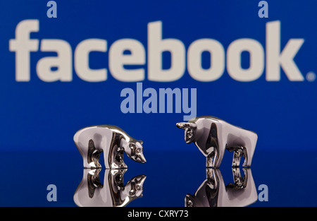 Der Bulle und der Bär stand vor einem Facebook-Logo, symbolisches Bild für den Aktienmarkt Facebook starten Stockfoto