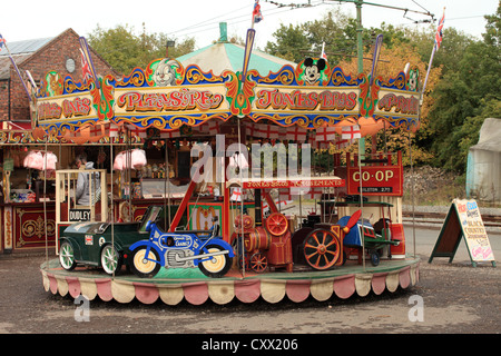 Traditionelle Messegelände Merry go round. Stockfoto