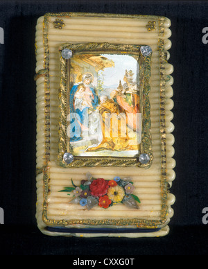 Wachs Kerze in Form eines Buches mit der Anbetung der Heiligen drei Könige, um 1900 Stockfoto