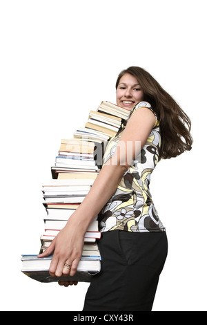 Student mit einem Stapel Bücher Stockfoto